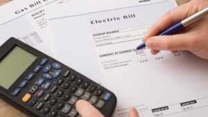 Electric Bill Charges Paper Form on the Table